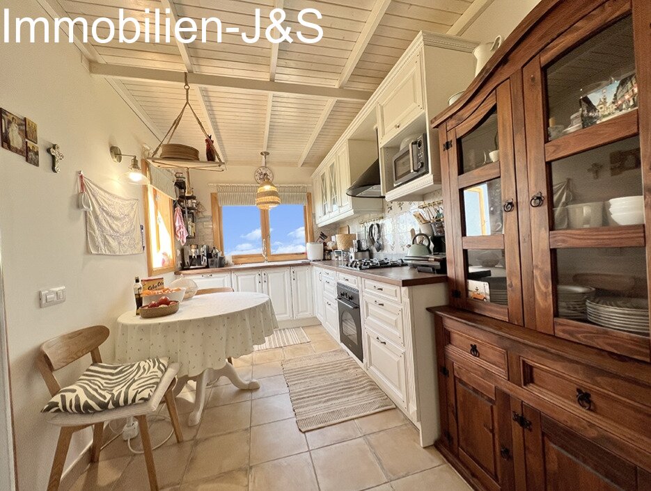 View of dining area and kitchen